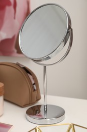 Photo of Dressing table with mirror and cosmetic products