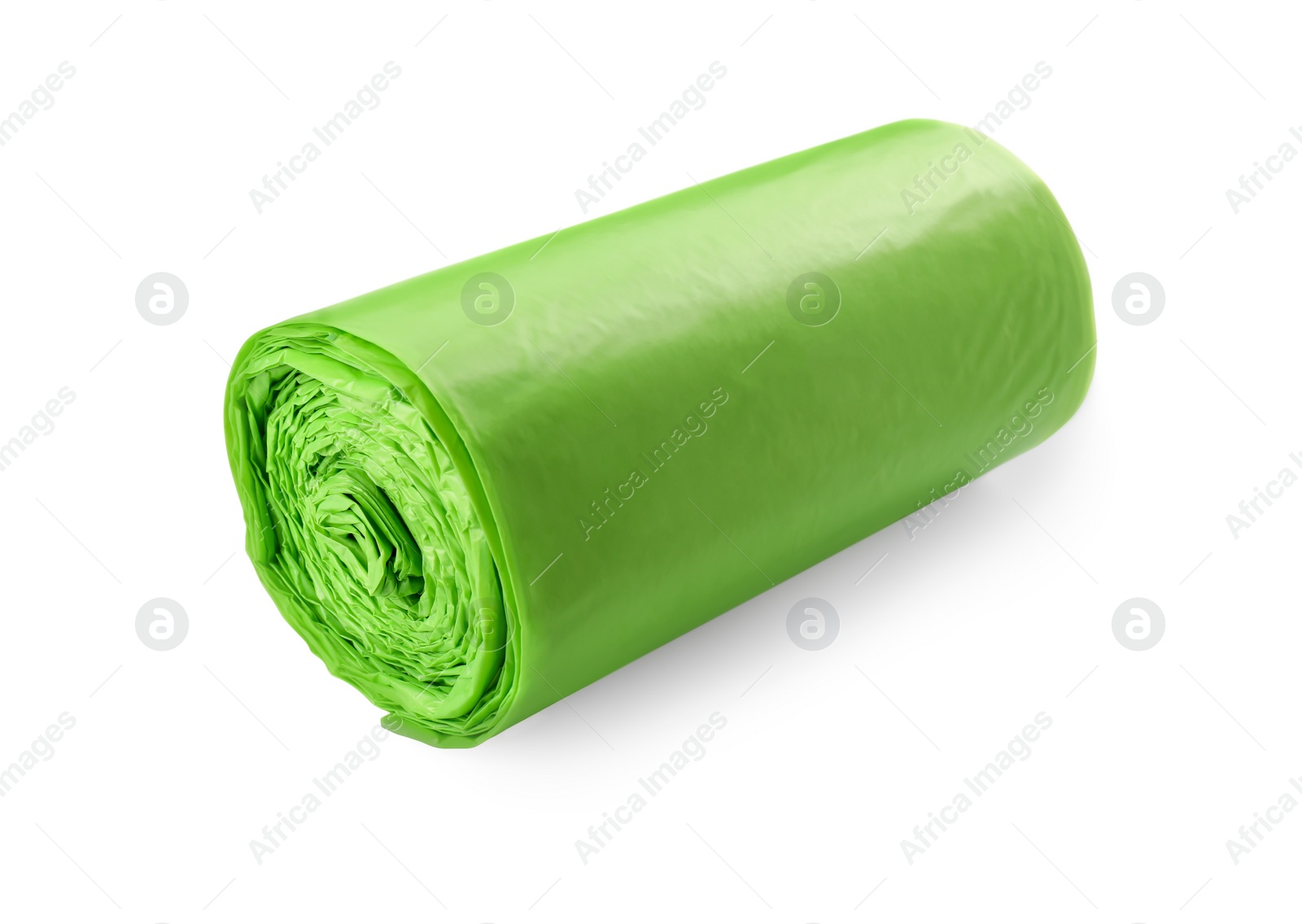 Photo of Roll of green garbage bags isolated on white