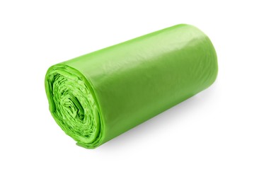 Photo of Roll of green garbage bags isolated on white