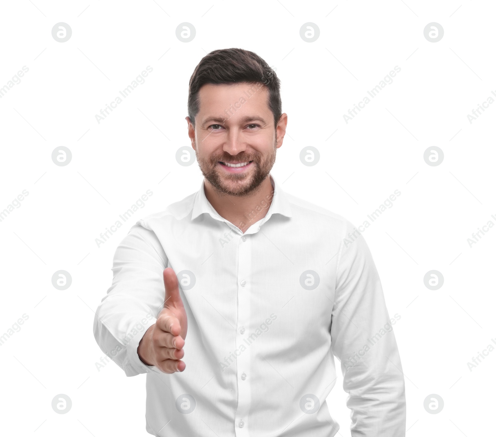 Photo of Happy man welcoming and offering handshake on white background
