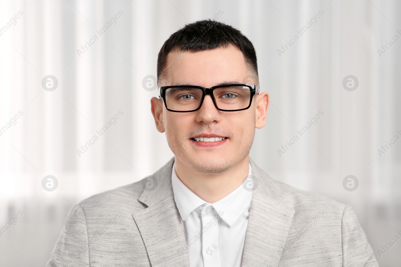 Photo of Young man having online video call indoors, view from web camera