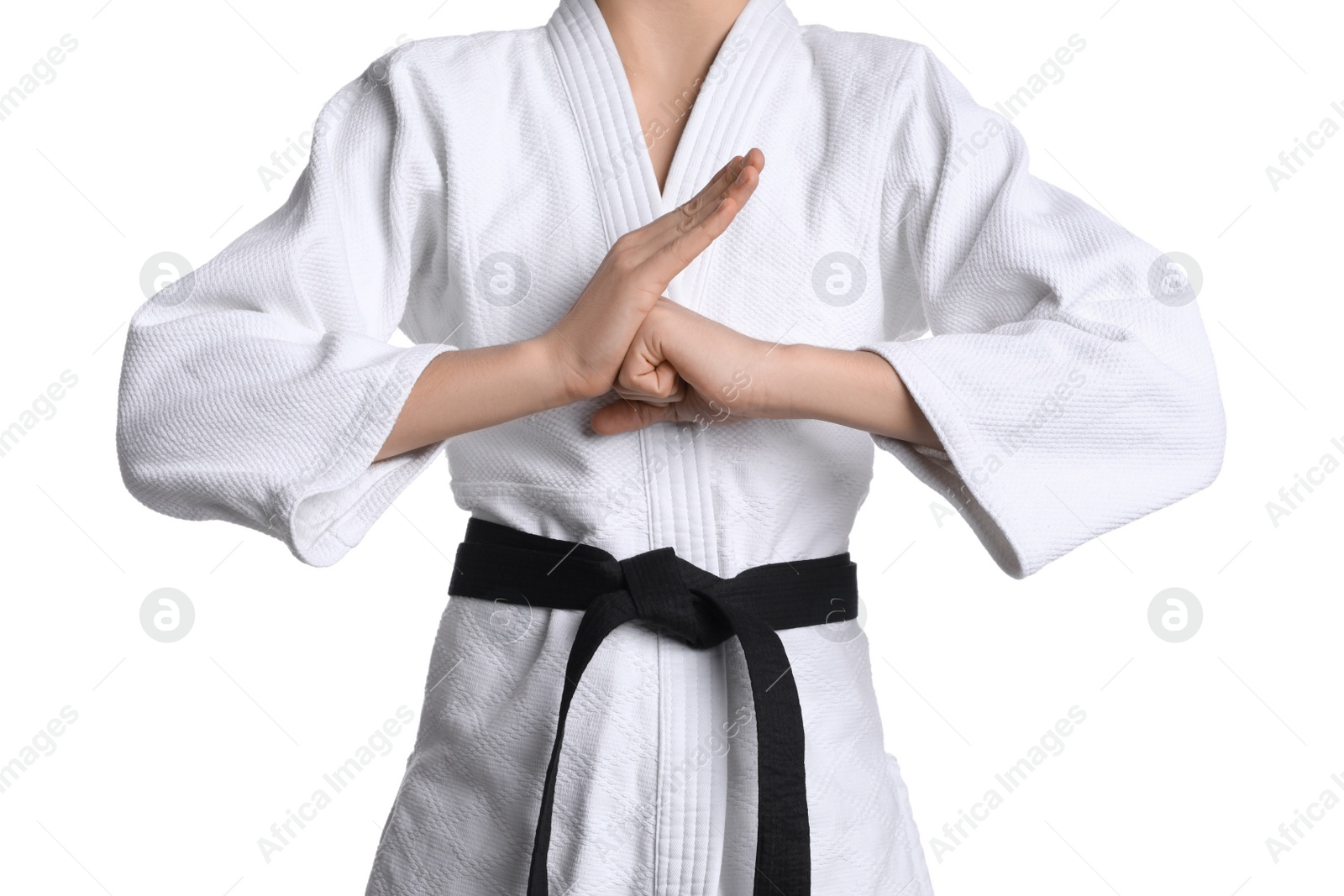 Photo of Martial arts master in keikogi with black belt on white background, closeup