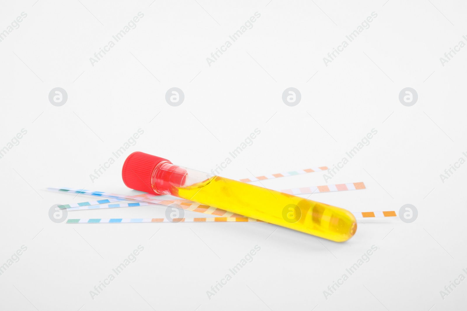Photo of Test tube with urine sample for analysis on white background