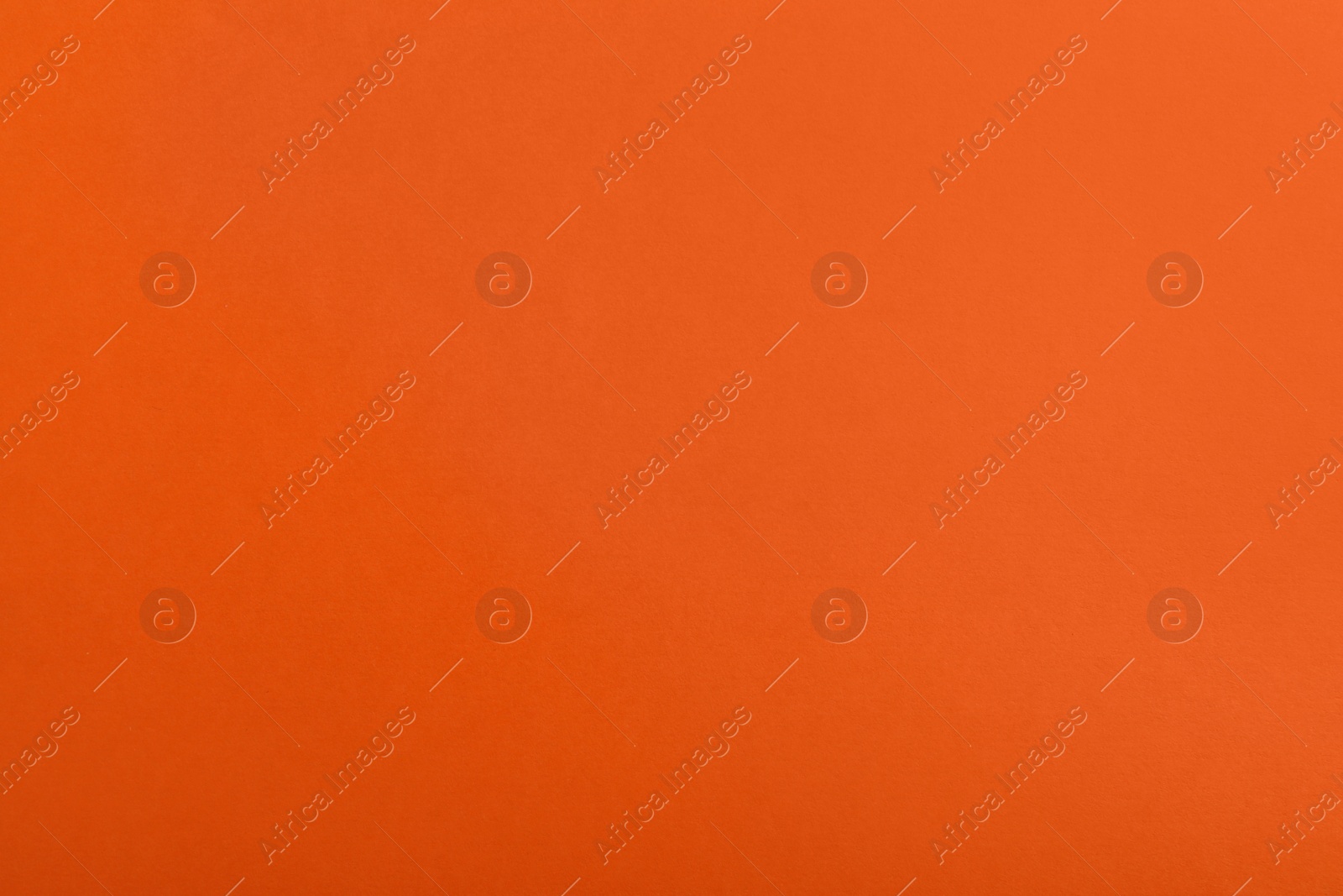 Photo of Abstract orange background, top view. Colorful paper