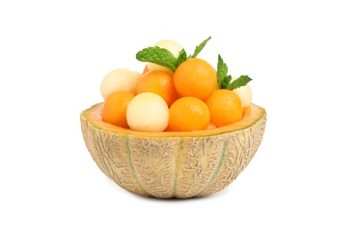 Photo of Different melon balls with mint on white background