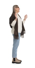 Photo of Senior woman greeting someone on white background