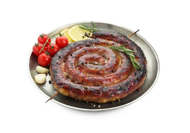 Delicious homemade sausage with spices, tomatoes and lemon isolated on white