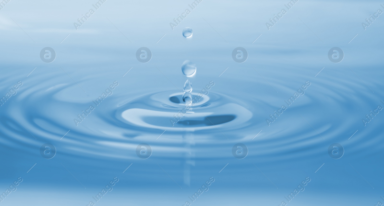 Photo of Splash of water with drops as background, closeup