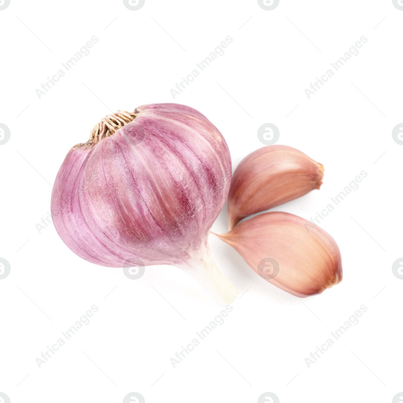 Photo of Head and cloves of fresh garlic isolated on white, top view