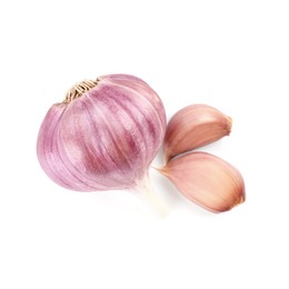 Photo of Head and cloves of fresh garlic isolated on white, top view