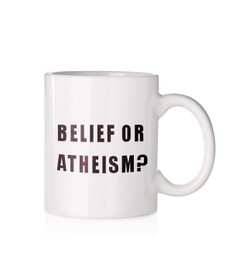 Image of Cup with phrase Belief Or Atheism? on white background