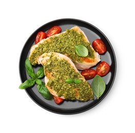Delicious chicken breasts with pesto sauce, tomatoes and basil isolated on white, top view