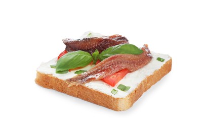 Photo of Delicious sandwich with cream cheese, anchovies, tomatoes and basil on white background