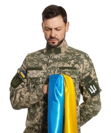 Photo of Soldier in military uniform with Ukrainian flag on white background