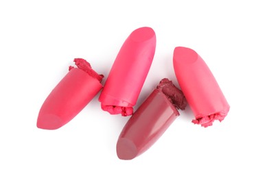 Photo of Different beautiful lipsticks on white background, top view