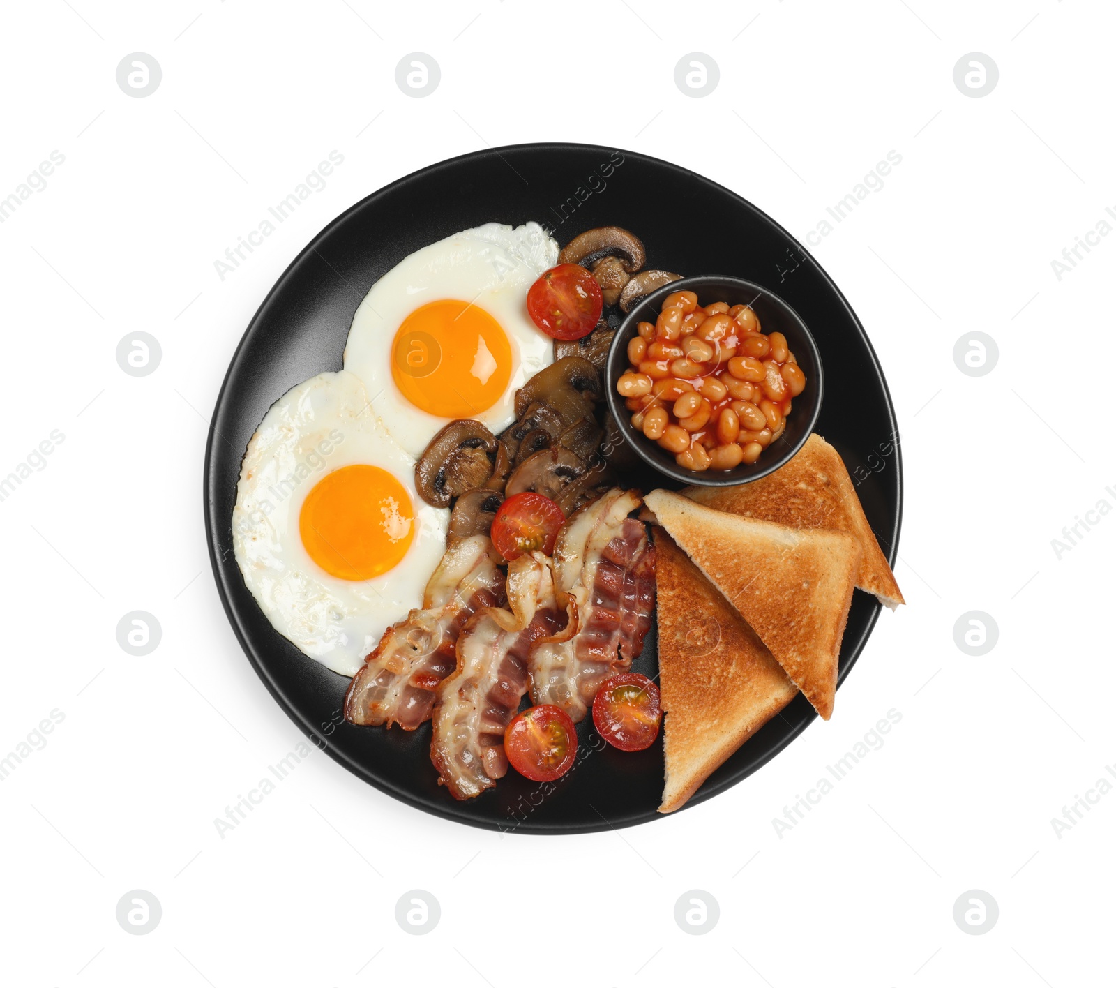 Photo of Plate with fried eggs, mushrooms, beans, bacon, tomatoes and toasted bread isolated on white, top view. Traditional English breakfast