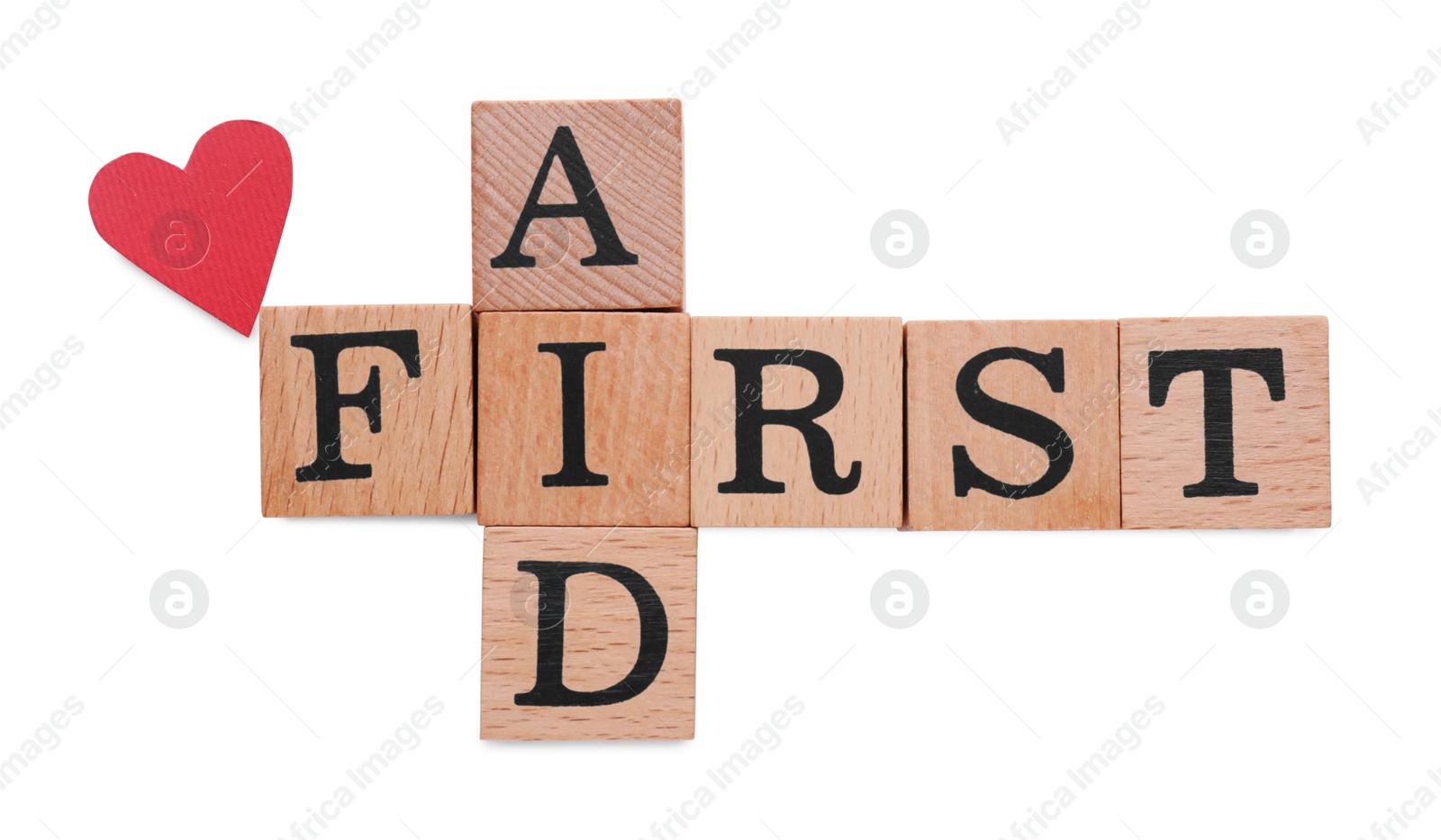 Photo of Words First Aid made of wooden cubes and cardboard heart isolated on white, top view