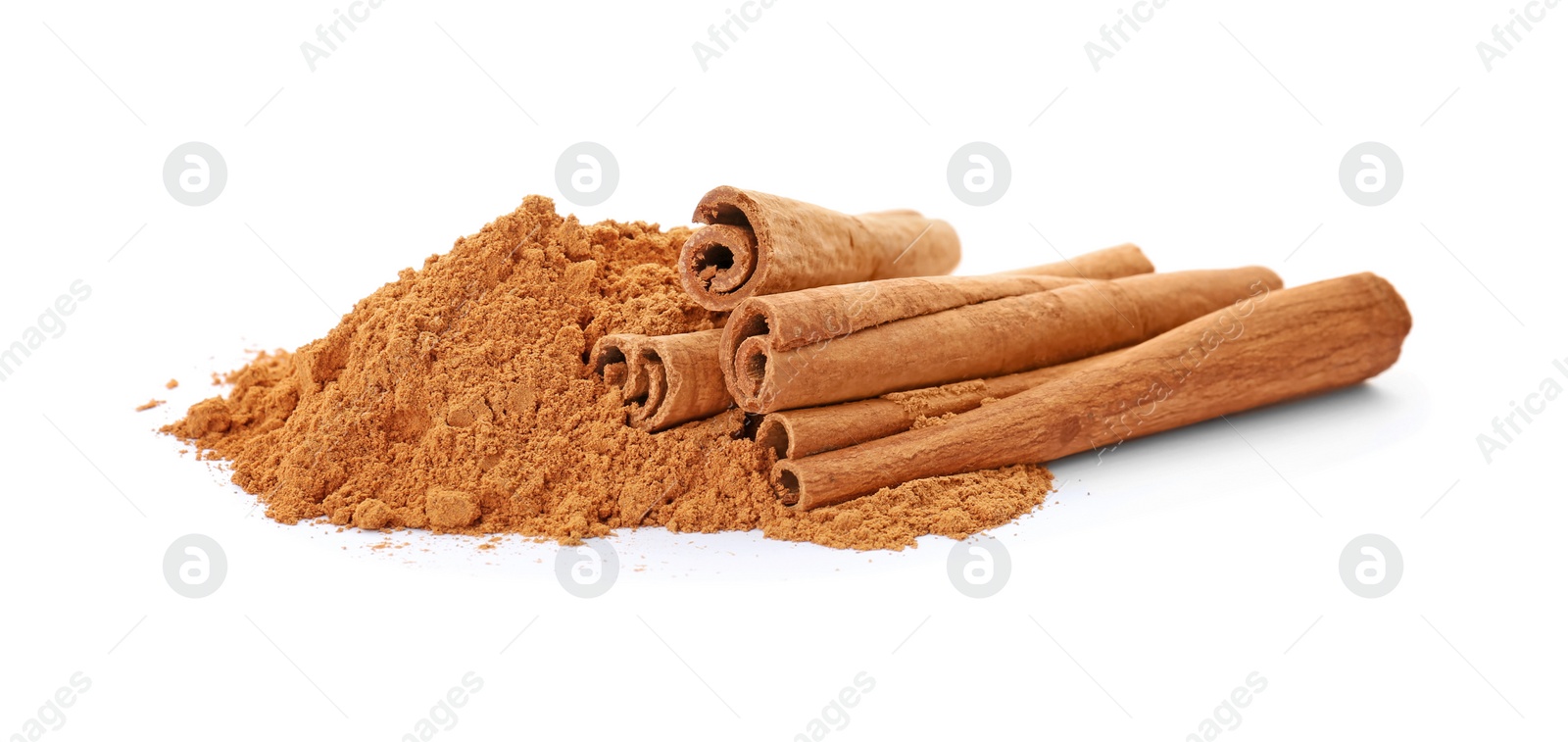 Photo of Aromatic cinnamon sticks and powder on white background