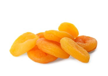 Photo of Pile of tasty apricots on white background. Dried fruits