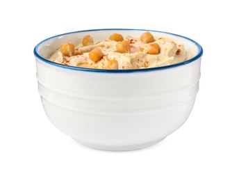 Photo of Bowl of tasty hummus with chickpeas and paprika isolated on white