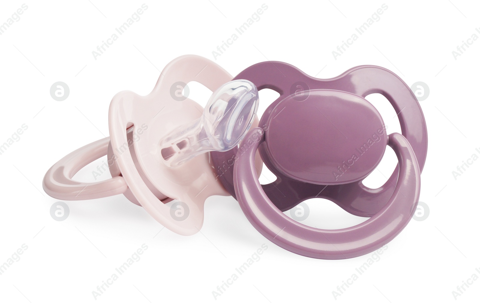 Photo of New different baby pacifiers on white background