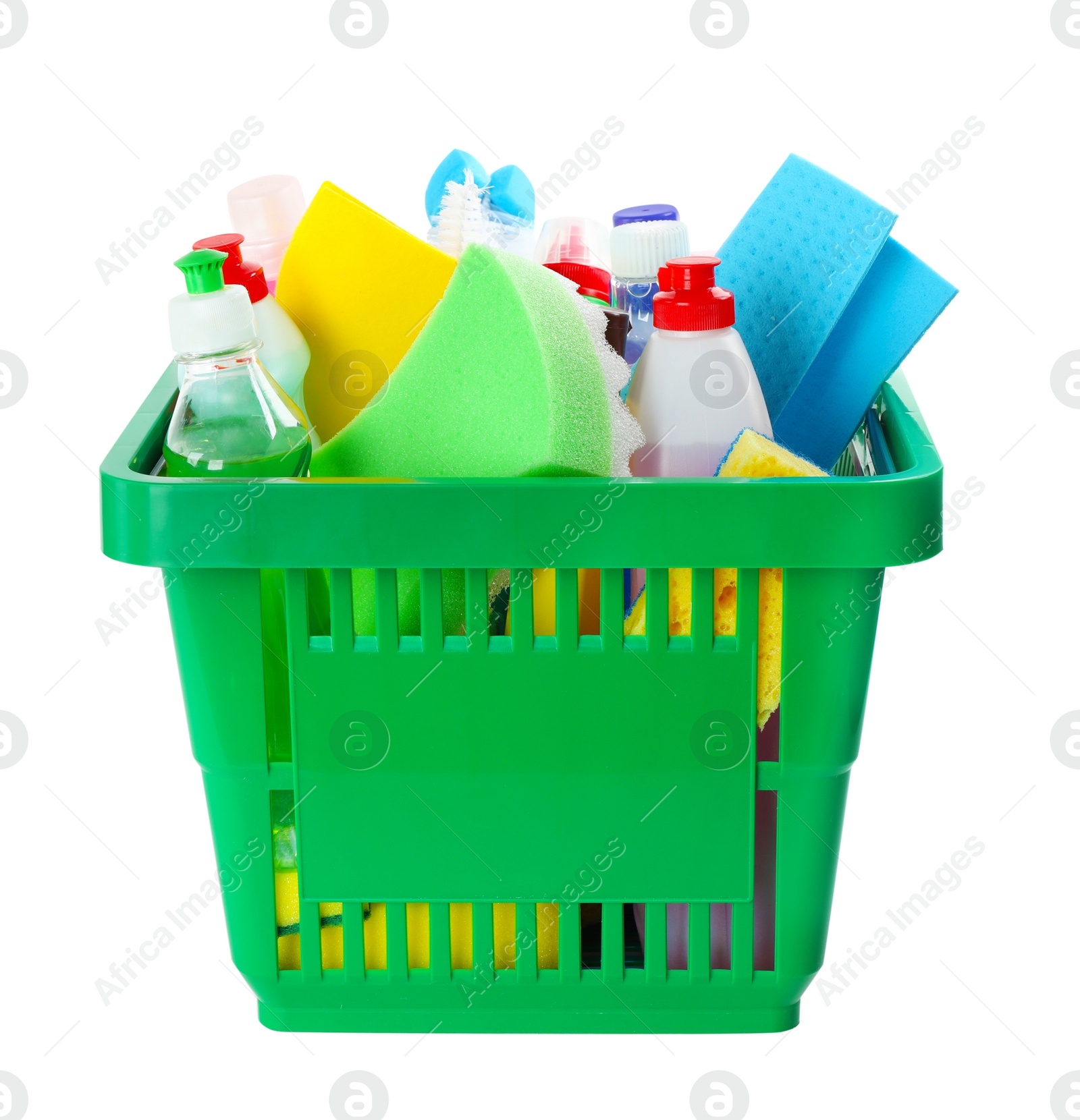 Photo of Green shopping basket with different household chemicals on white background