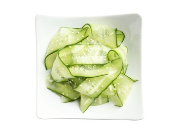 Photo of Plate with delicious cucumber salad on white background, top view