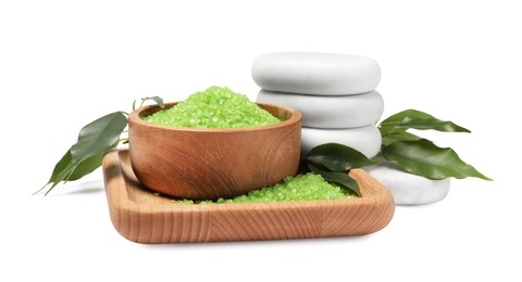 Green sea salt in bowl, spa stones and leaves isolated on white