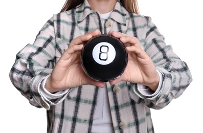 Photo of Woman holding magic eight ball on white background, closeup