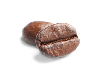 Photo of Fresh roasted coffee beans on white background