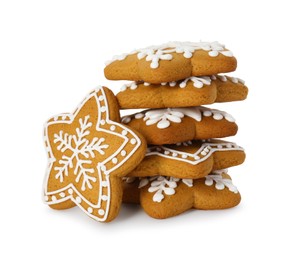 Photo of Tasty star shaped Christmas cookies with icing isolated on white