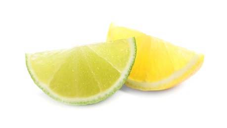 Photo of Slices of fresh ripe lemon and lime on white background