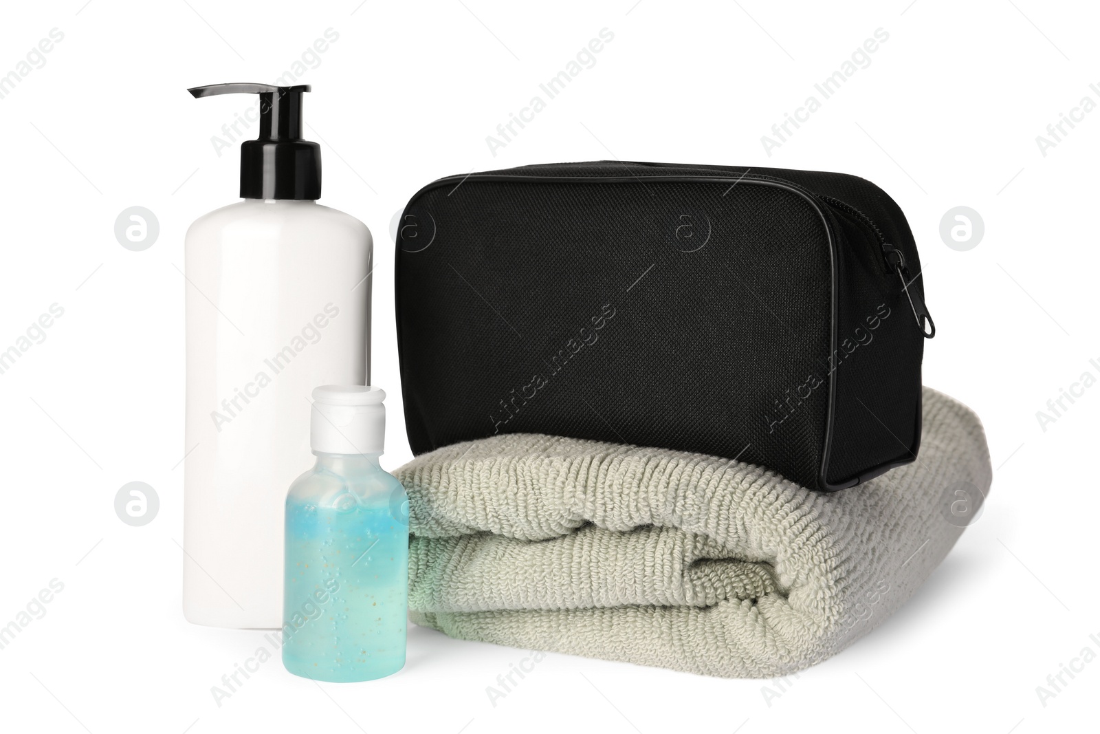 Photo of Preparation for spa. Compact toiletry bag and different cosmetic products on white background