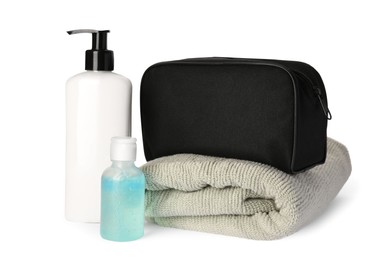 Preparation for spa. Compact toiletry bag and different cosmetic products on white background