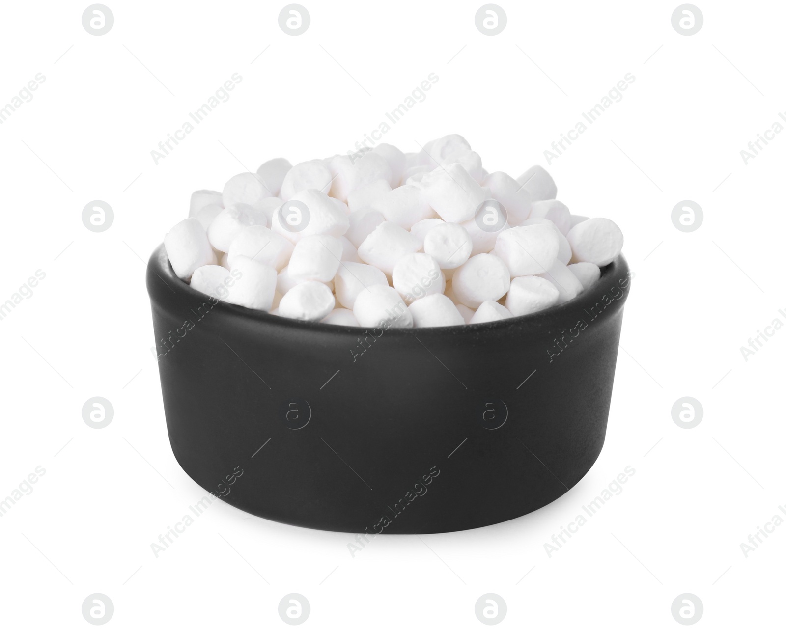 Photo of Bowl of delicious puffy marshmallows isolated on white