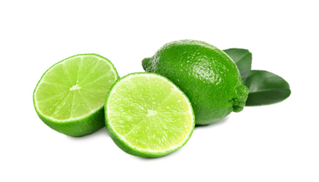 Photo of Fresh ripe green limes isolated on white