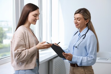 Professional doctor working with patient in hospital