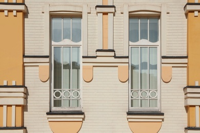 Wall of vintage building with beautiful windows