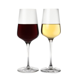 Photo of Glasses of different delicious expensive wines on white background