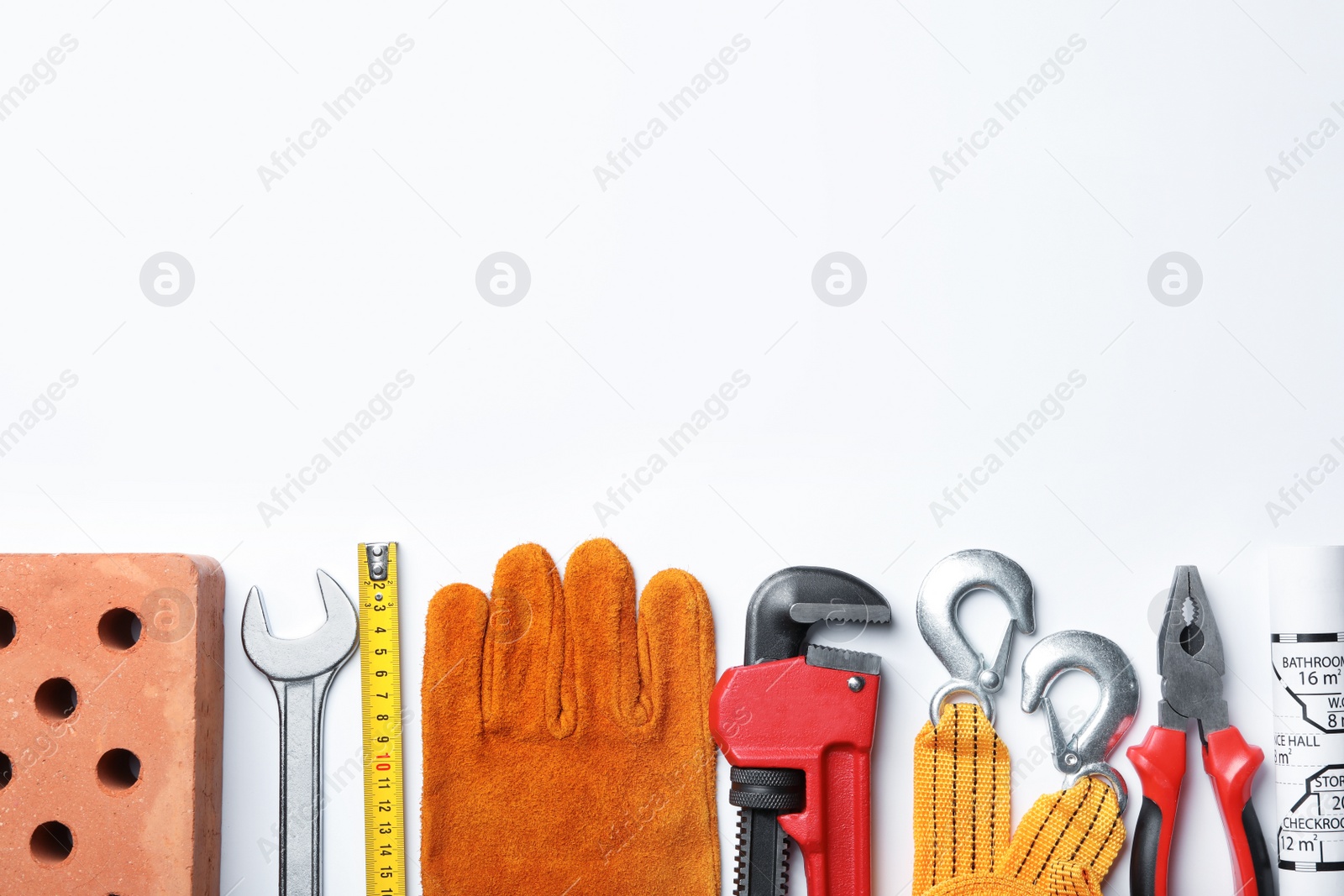 Photo of Composition with different construction tools on white background, top view