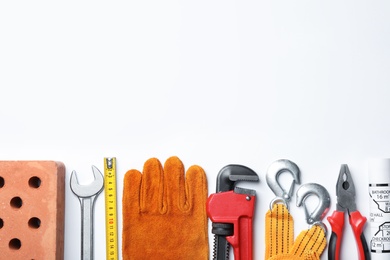 Photo of Composition with different construction tools on white background, top view