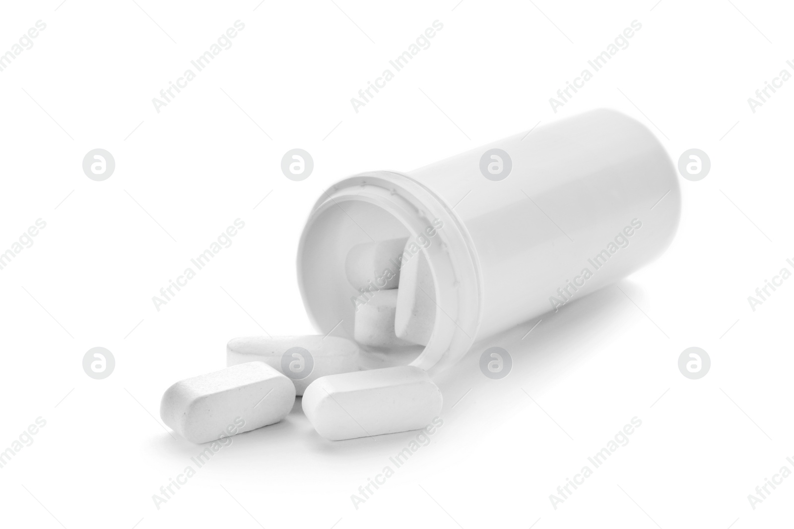 Photo of Container with pills on white background