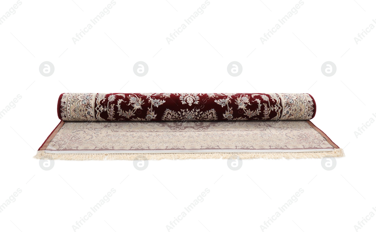 Photo of Rolled carpet with pattern on white background. Interior element