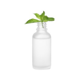 Photo of Bottle of essential oil and mint on white background