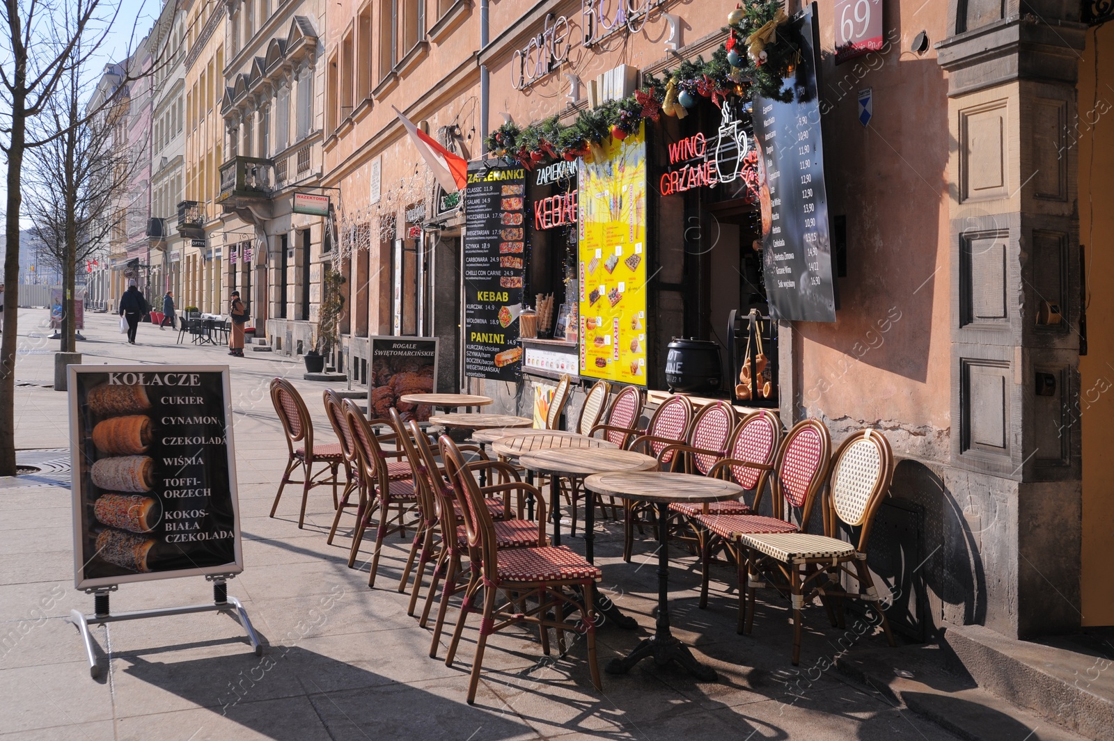 Photo of WARSAW, POLAND - MARCH 22, 2022: Beautiful view of modern cafe with outdoor terrace