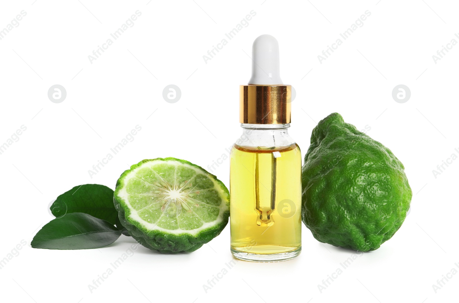 Photo of Bottle of essential oil, fresh bergamot fruits and leaves on white background