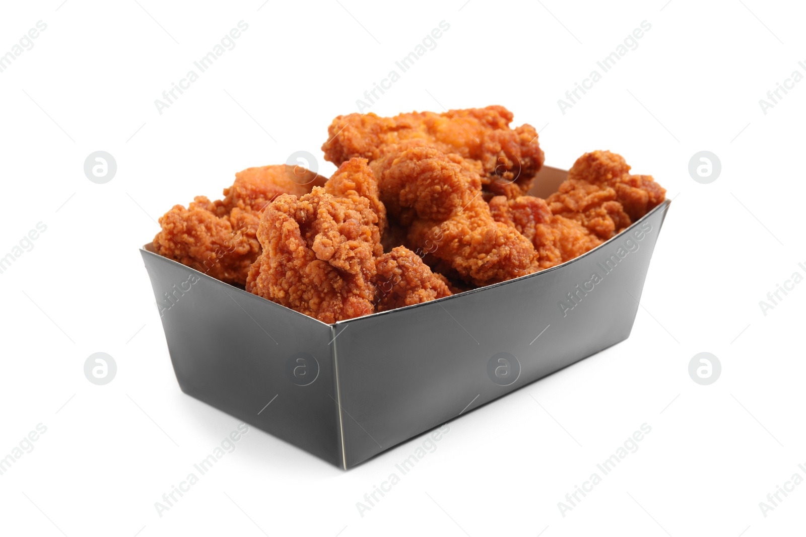 Photo of Tasty deep fried chicken pieces isolated on white