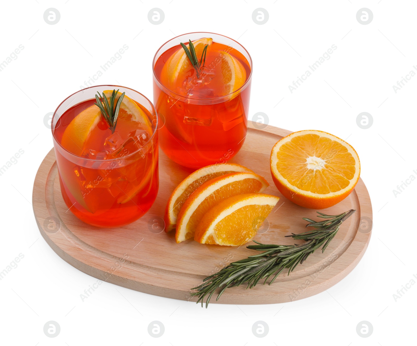 Photo of Aperol spritz cocktail in glasses, orange slices and rosemary isolated on white