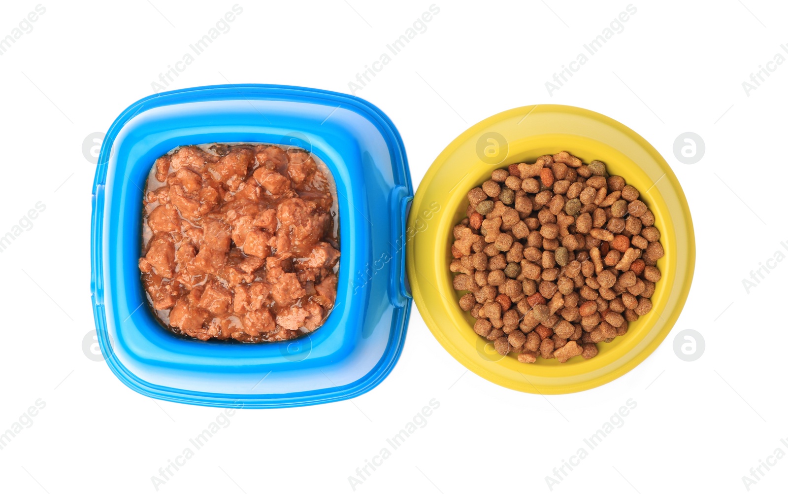 Photo of Dry and wet pet food in feeding bowls isolated on white, top view