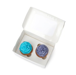 Photo of Box with delicious cupcakes on white background, top view